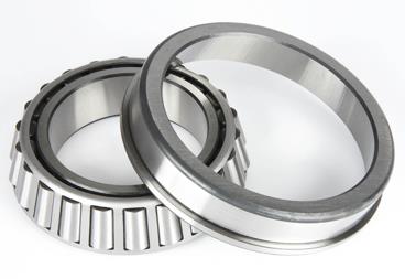 Single row tapered roller bearing with flanged outer ring